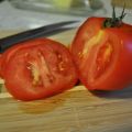 Eigenschaften und Beschreibung der Tomatensorte President, deren Ertrag und Anbau